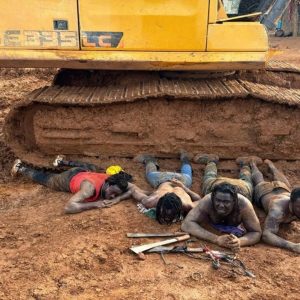 NAIMOS TaskForce Overpowers and Arrests Machete-Wielding Machomen whiles guarding Galamsey Site in Osibo Town. Owner of the Galamsey Site Currently on the Run.